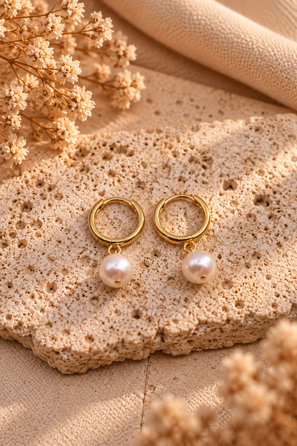 Goldene Ohrringe mit Creolen